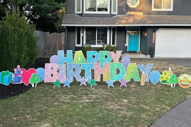 Personalized celebratory yard-card display with colorful graphics