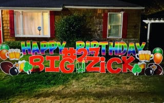 Rainbow Happy Birthday Yard Card with 24 inch letters with beer mugs and balloons decorating a yard in West Linn, OR